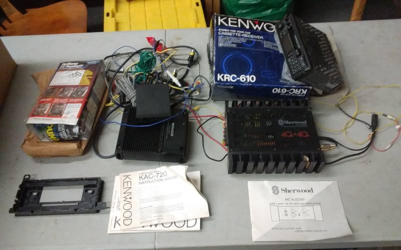 lot 6 image: Car Stereo Related, 2-Amps, 1-Cassette Desk & Mounting Kit