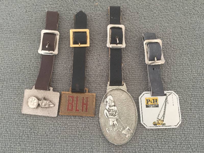 lot 30 image: 4 Watch  Key Fobs on Leather Straps - Power Cranes & Shovels, BLH, Ingersoll Rand Co, Saw