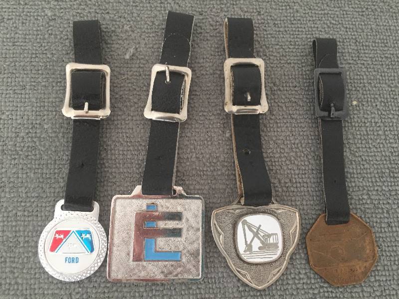 lot 60 image: 4 Watch  Key Fobs on Leather Straps - Ford, Furlow-Laughlin, Crane, Pennsylvania Super Highway