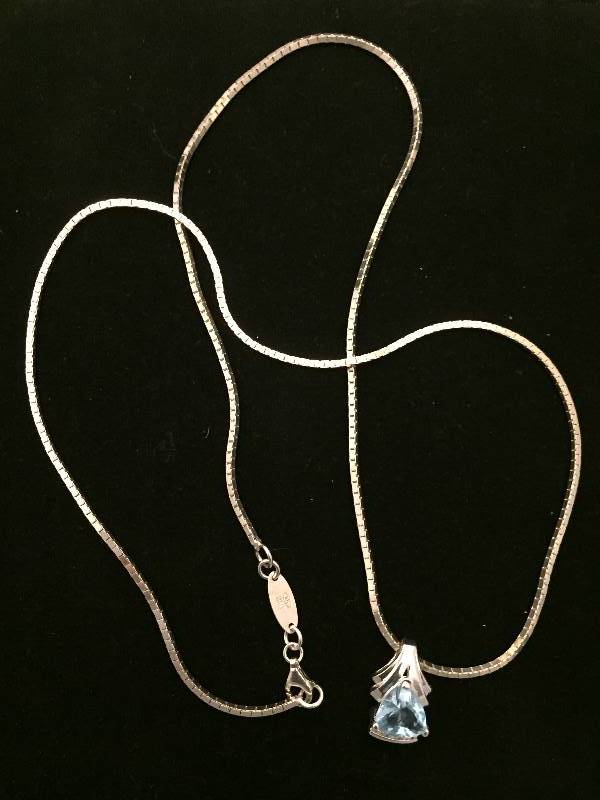 lot 13 image: 24 Sterling Silver Box Chain w Light Blue Stone Pendant