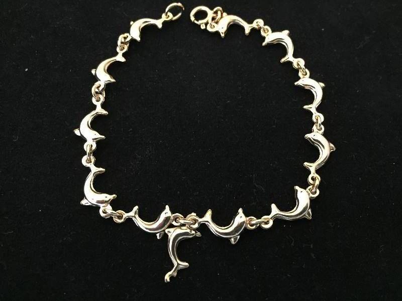 lot 121 image: Sterling Silver Dolphin Bracelet - 7.25 long
