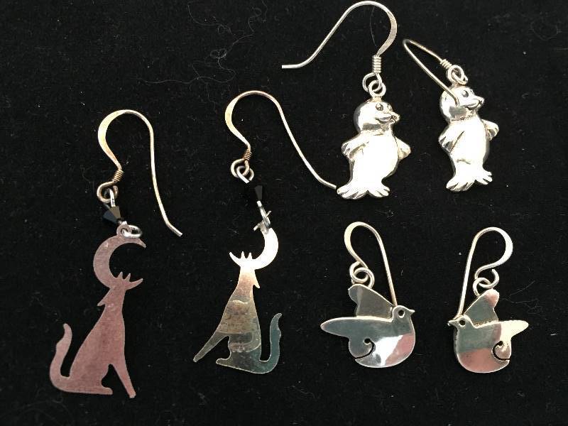 lot 141 image: 3 Pairs Sterling Silver Pierced Earrings - Coyotes, Birds, Penguins