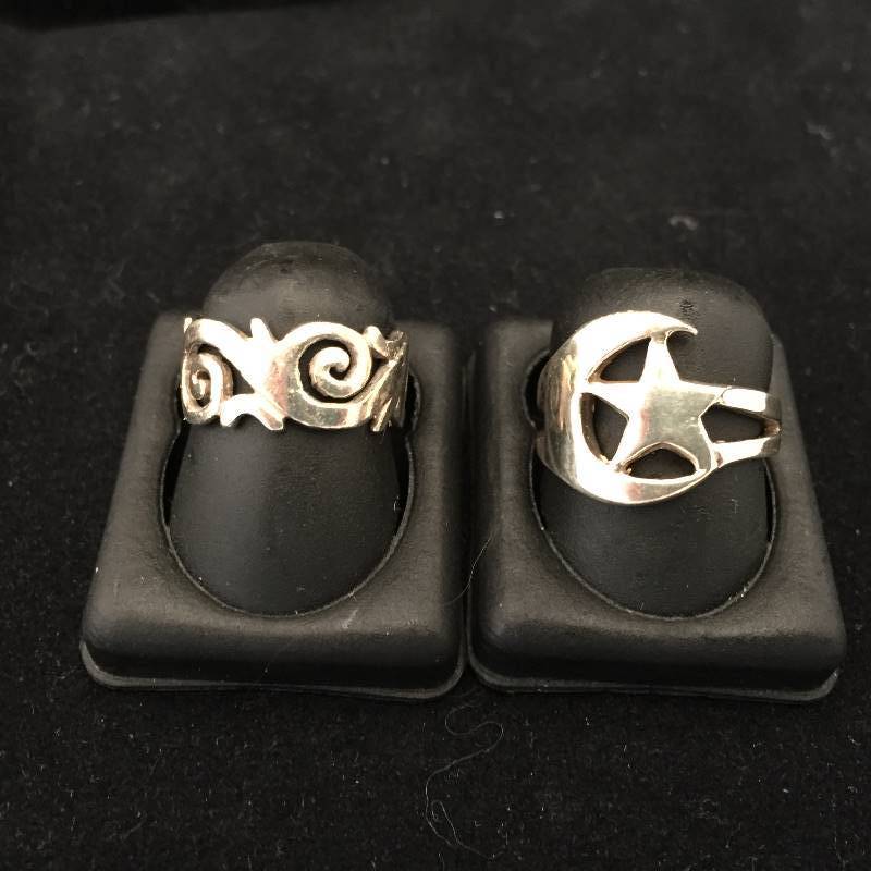 lot 140 image: 2 Sterling Silver Rings - StarMoen & Wave