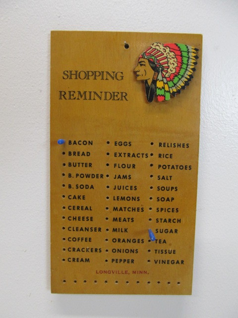 lot 128 image: Vintage Wooden Native American Pegboard Shopping List