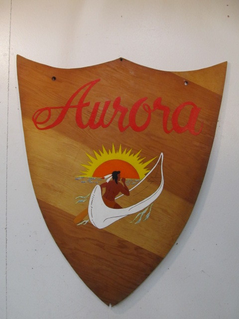 lot 191 image: LARGE Vintage Hand Painted AURORA Indian Wooden Shield Sign - 36 Tall