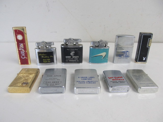 lot 29 image: Group of Vintage Advertising Cigarette Lighters #2
