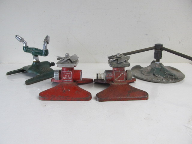 lot 62 image: 4 Vintage Deco Metal Sprinklers