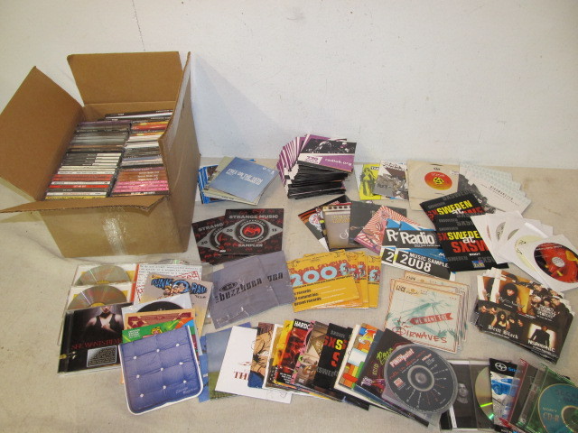 lot 99 image: LARGE Lot of Brand New Mostly Unopened Promotional Music CDs