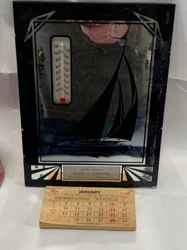 lot 57 image: Vintage 1938 Mirror, Calendar, Thermometer Advertising Wahpeton ND