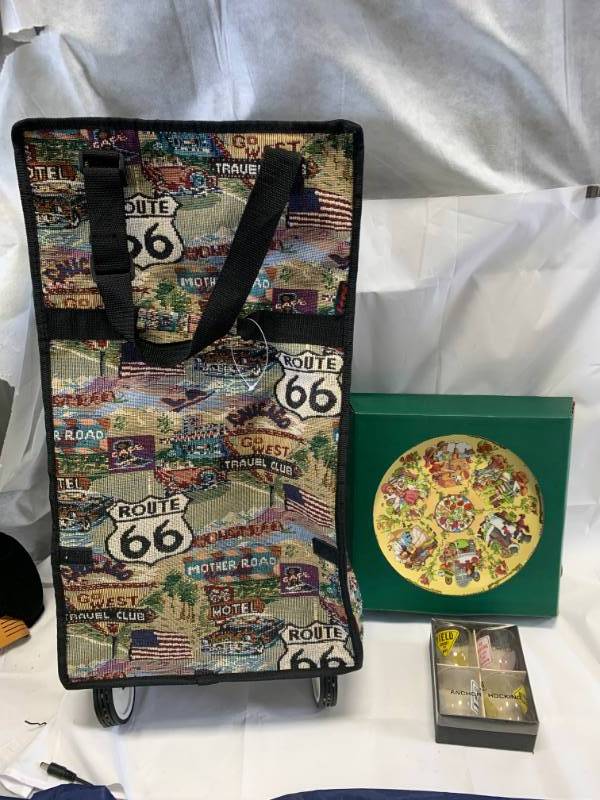 lot 82 image: Maggie Murphy 1982 Plate, 4 Shot Glasses, Travel Bag