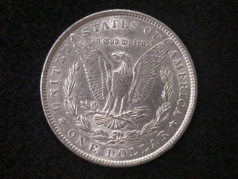 lot 6 image: 1886 Morgan Silver Dollar...