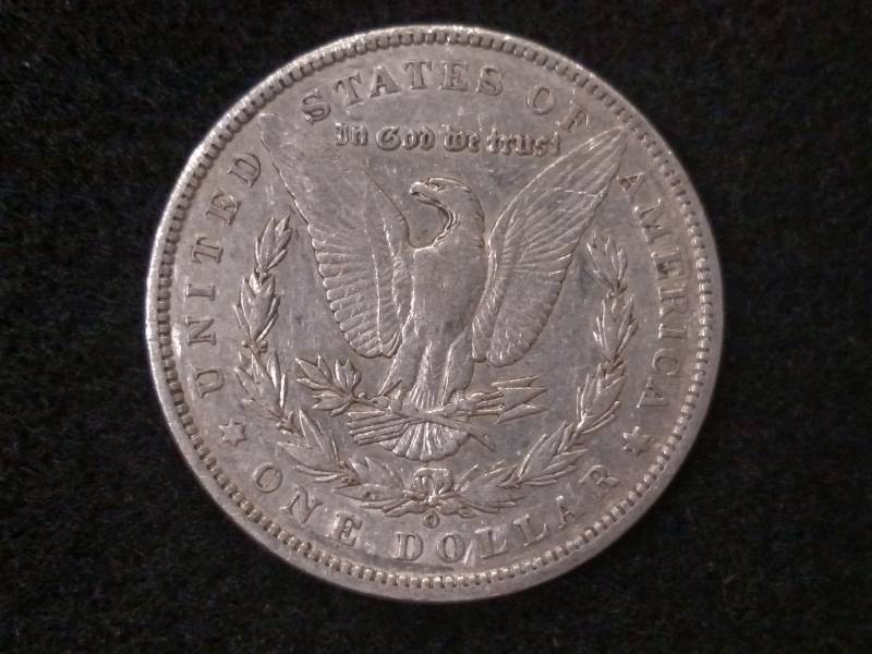 lot 15 image: 1899 O Morgan Silver Dollar...
