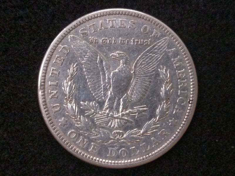 lot 25 image: 1921 S Morgan Silver Dollar...