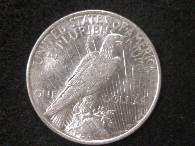 lot 28 image: 1922 Peace Silver Dollar...