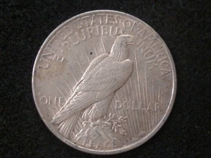 lot 29 image: 1922 D Peace Silver Dollar...