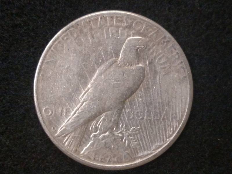 lot 32 image: 1922 S Peace Silver Dollar...