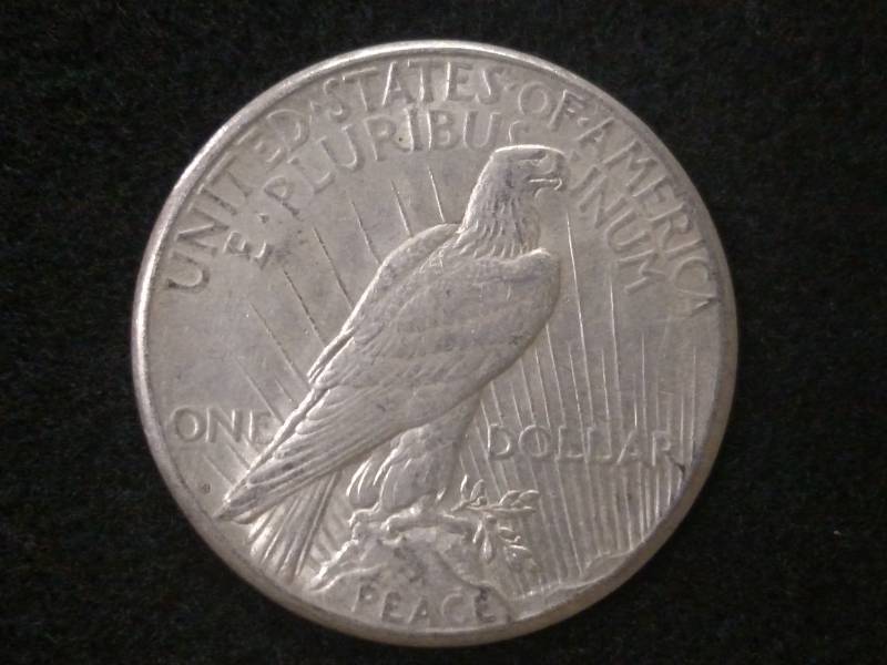 lot 33 image: 1922 S Peace Silver Dollar...