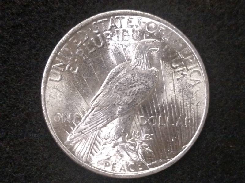 lot 35 image: 1923 Peace Silver Dollar...