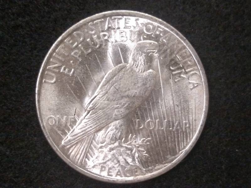 lot 38 image: 1923 Peace Silver Dollar...