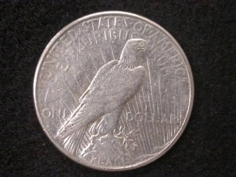 lot 42 image: 1923 S Peace Silver Dollar...