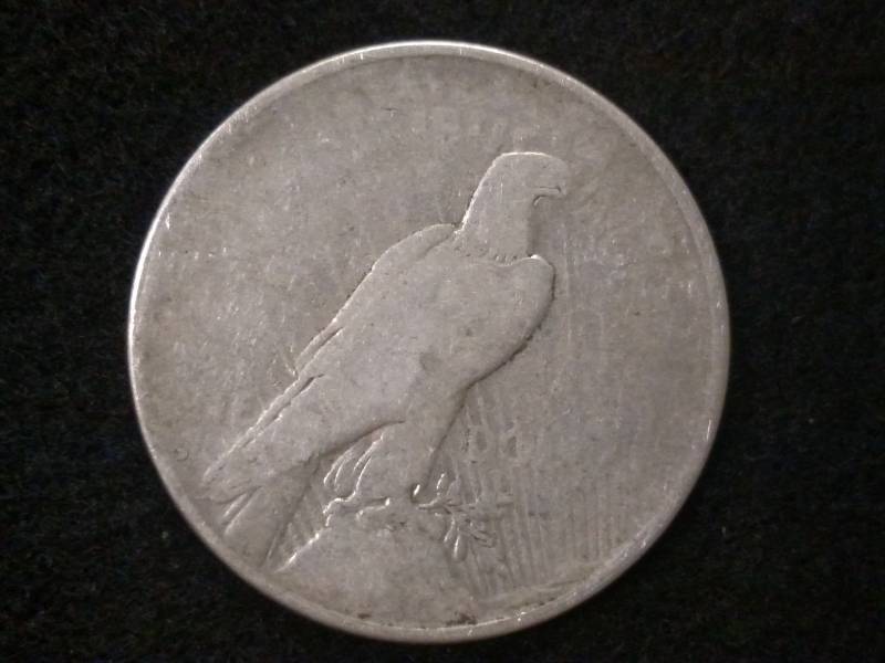 lot 48 image: 1934 D Peace Silver Dollar...
