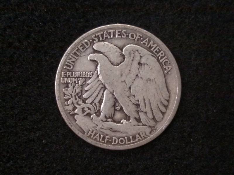 lot 53 image: 1934 Walking Liberty Silver Half Do...