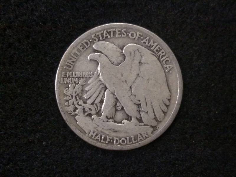 lot 55 image: 1935 Walking Liberty Silver Half Do...