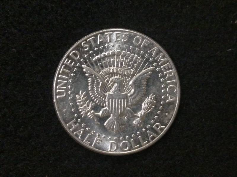 lot 102 image: 1964 Kennedy Silver Half Dollar...