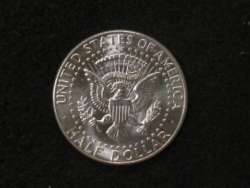 lot 103 image: 1964 Kennedy Silver Half Dollar...