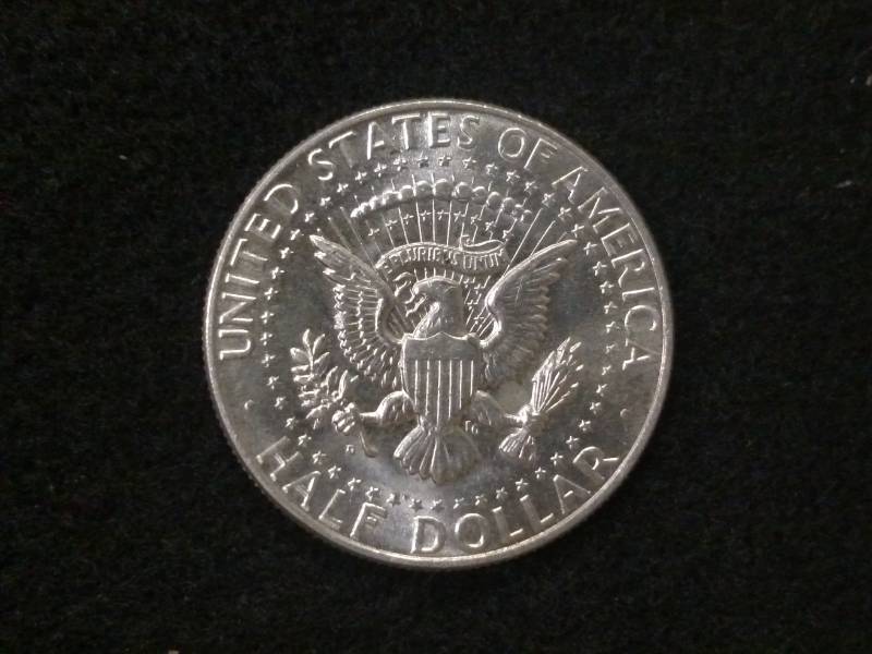 lot 104 image: 1964 D Kennedy Silver Half Dollar...