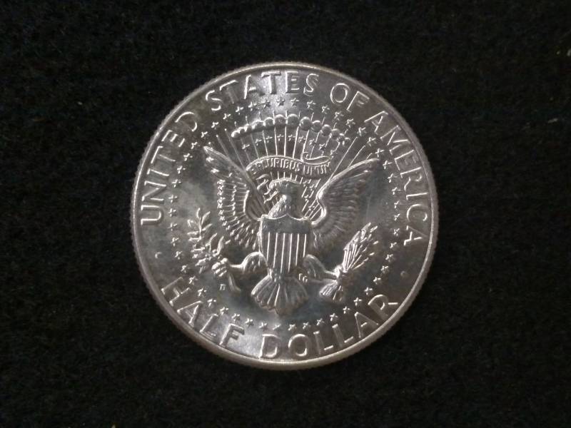 lot 107 image: 1964 D Kennedy Silver Half Dollar...