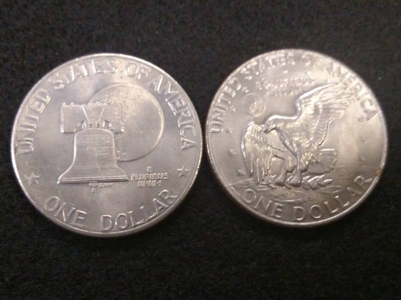lot 129 image: 1976 & 1977 D Eisenhower Dollars...