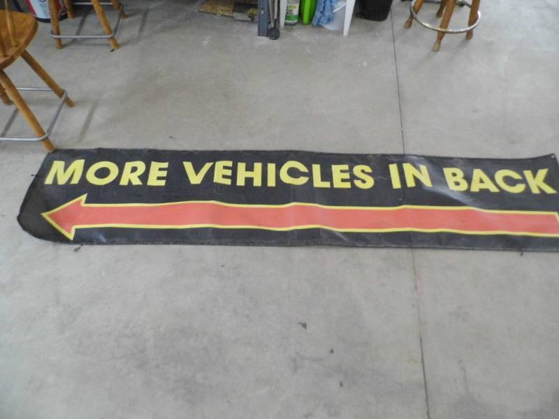 lot 18 image: Vehicles In Back Banner