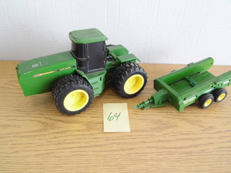 lot 64 image: John Deere Tractor w Implement