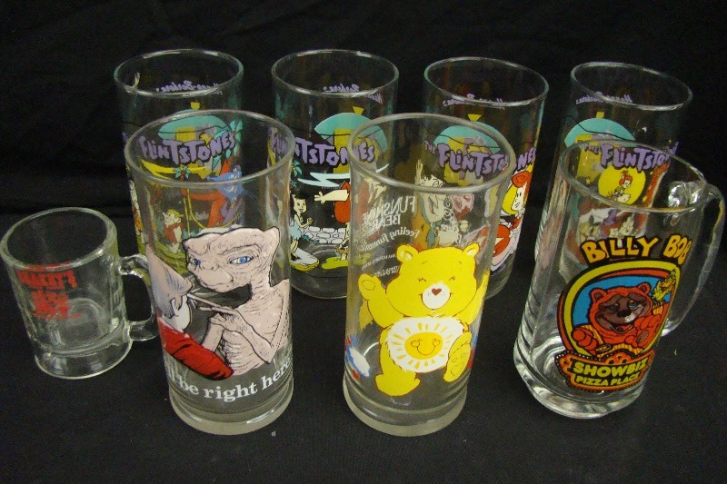 lot 45 image: Vintage 80s 90s E.T. Flinstones Care Bears Showbiz Shakeys Collectible Glasses