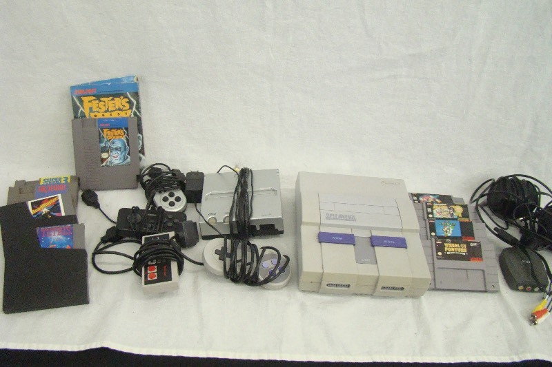 lot 75 image: Nintendo and Super NES Bundle with Games and Controllers