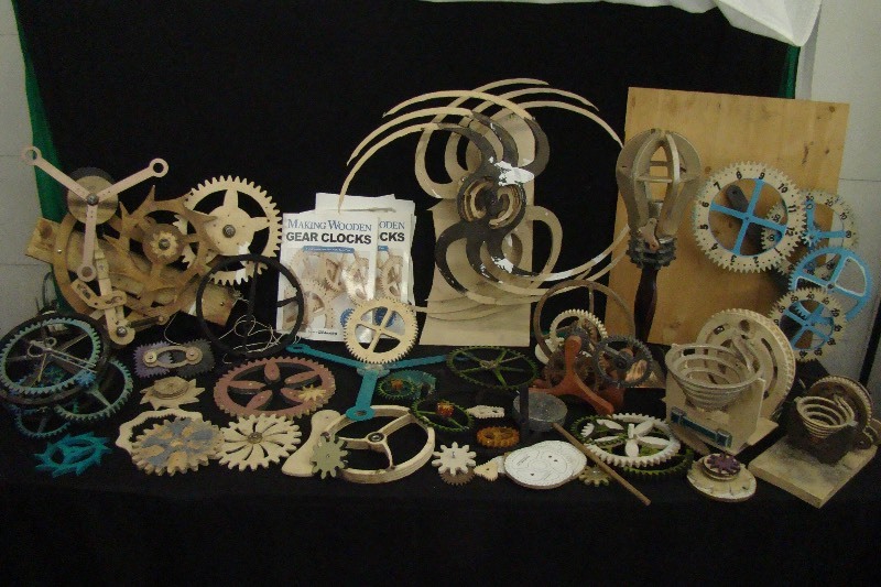 lot 200 image: Lot of Hand Cut Gears Clock Pieces Etc