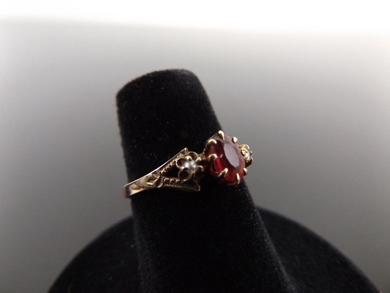 lot 111 image: 10k Ruby and Pearl Ring Size 5.75