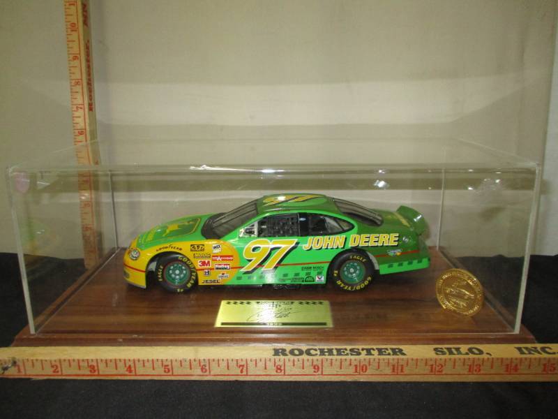 lot 115 image: John Deere 1999  #1797 Diecast Car In a display box and collector coin