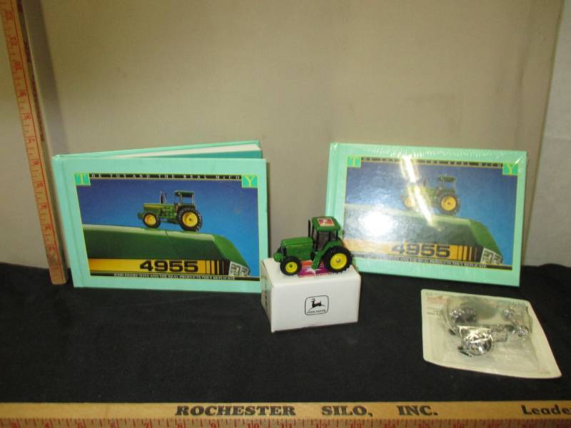 lot 122 image: Two John Deere Books and 2 Tractors