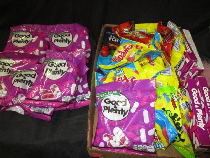 lot 150 image: 30 packs og good and plenty, hot tomalies, swedish fish, and jolly ranchers