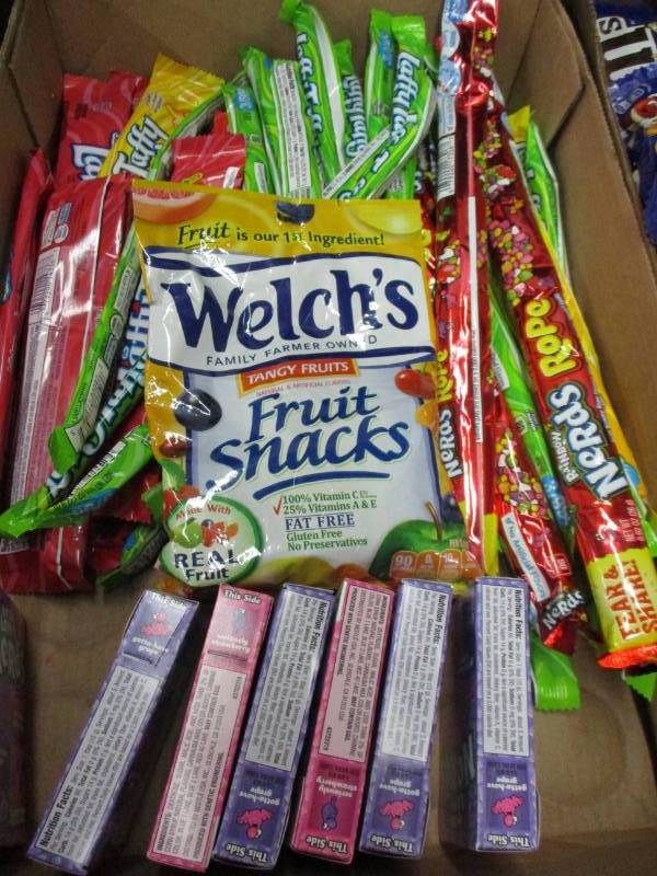lot 149 image: 66 laffy taffy, fruit snacks and nerds