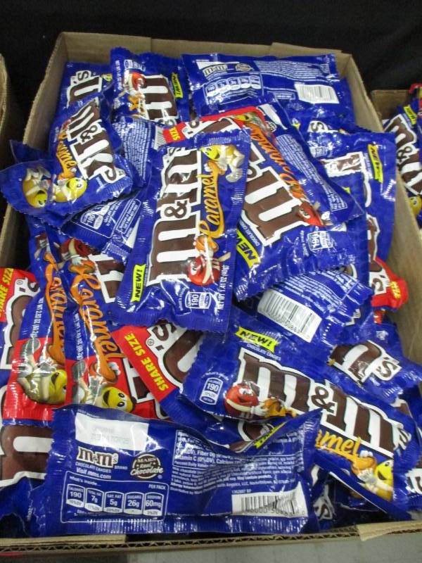 lot 148 image: 60 packs pf carmel m&ms