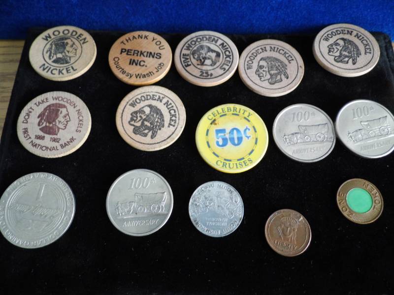 lot 116 image: Tokens - Wooden Nickels