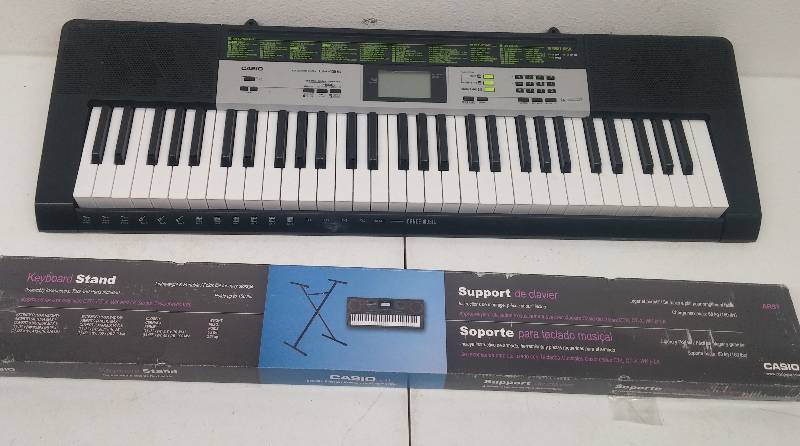 lot 43 image: Casio LK-135 Keyboard and stand