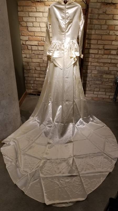 lot 74 image: Antique Ivory Satin Wedding Gown with Net Caplet