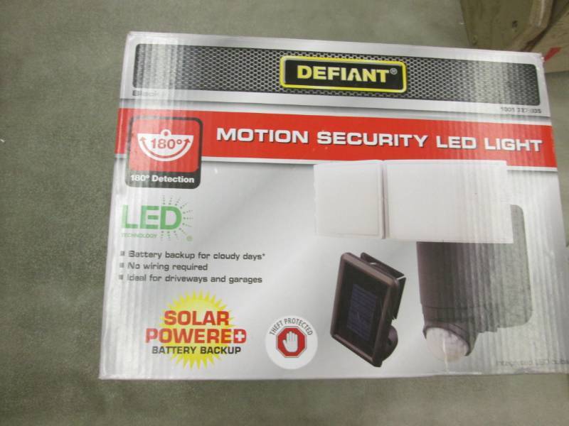 lot 75 image: Defiant 180° Black Solar Powered M...