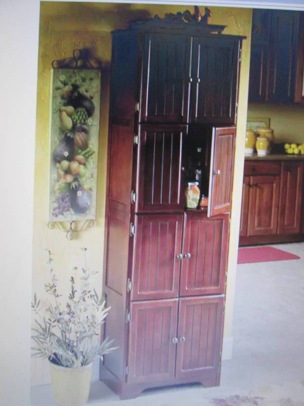 lot 384 image: 8 Door Wall Cabinet open box Retail...