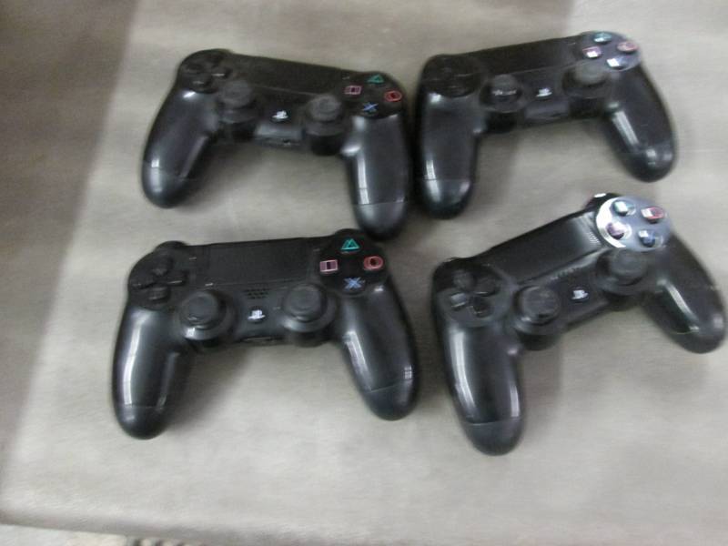 lot 265 image: Lot of 4 Play Station Controllers...