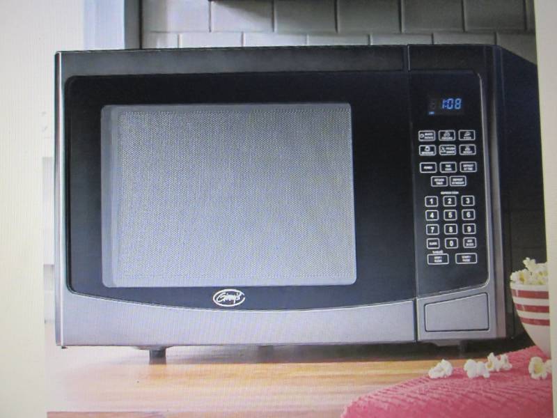 lot 306 image: 1.2 Cubic Foot Microwave by Ginnys...